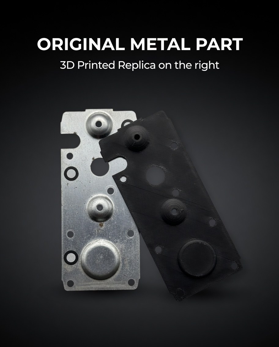 Original metal part next to 3D printed replica